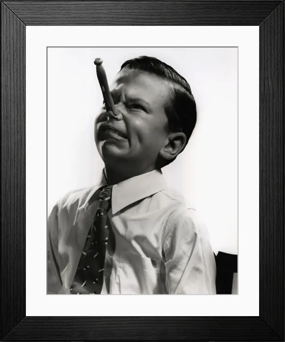 Framed Print : Boy With Clothespin on Nose Framed Print : Boy With Clothespin on Nose