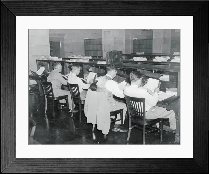 Framed Print : Corporate Attorneys Searching Patent Records Framed Print : Corporate Attorneys Searching Patent Records
