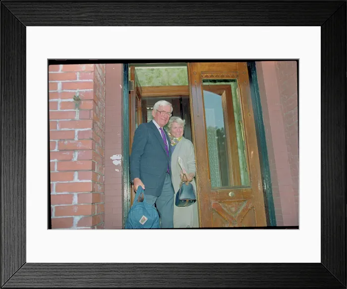 Framed Print : Norman Ramsey and Wife Leaving Their Home Framed Print : Norman Ramsey and Wife Leaving Their Home