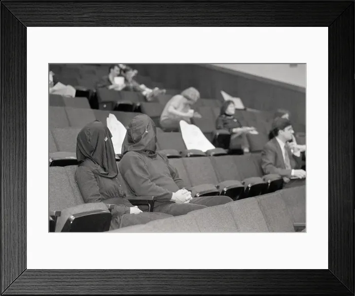 Framed Print : Man & Woman W / Black Hoods Seated Framed Print : Man & Woman W / Black Hoods Seated
