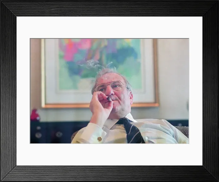 Framed Print : Lee Iacocca Smoking a Cigar Framed Print : Lee Iacocca Smoking a Cigar