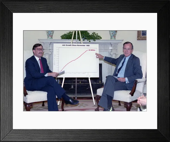 Framed Print : George Bush Pointing to Economic Chart