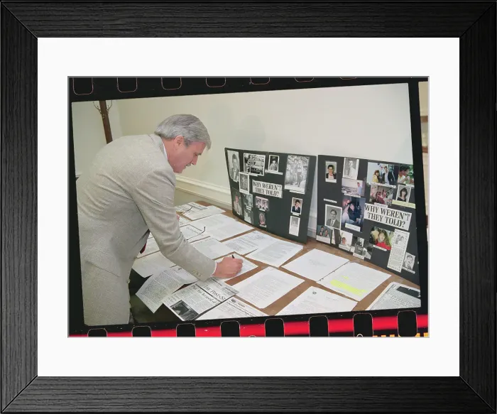 Framed Print : Relative of Pan Am Crash Victim Signing Petition Framed Print : Relative of Pan Am Crash Victim Signing Petition