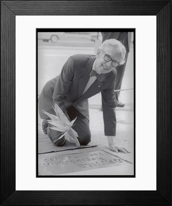 Framed Print : Orville Redenbacher Signing Name in Cement Framed Print : Orville Redenbacher Signing Name in Cement