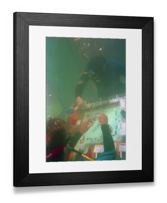 Framed Print : Divers Playing Monopoly Underwater Framed Print : Divers Playing Monopoly Underwater