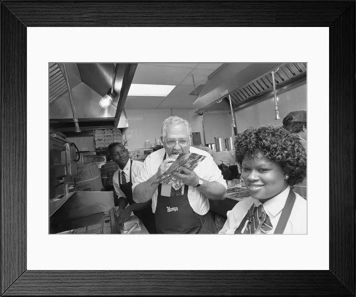 Framed Print : Dave Thomas Eating a Hamburger Framed Print : Dave Thomas Eating a Hamburger