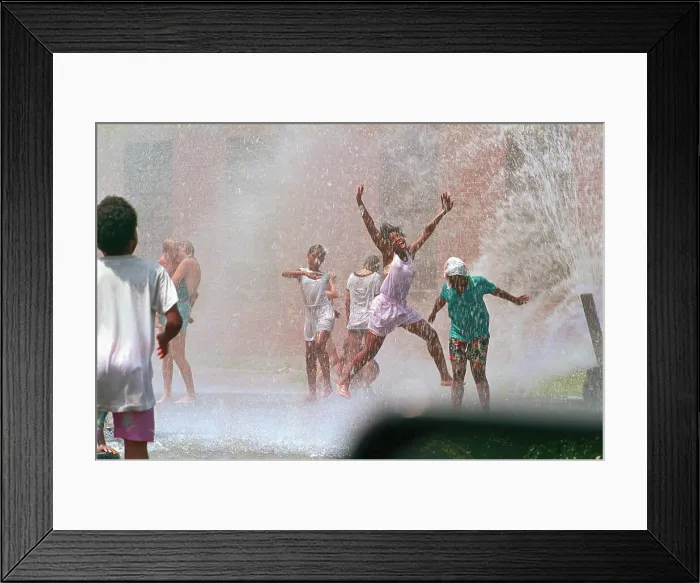 Framed Print : Children Playing in Water Spray