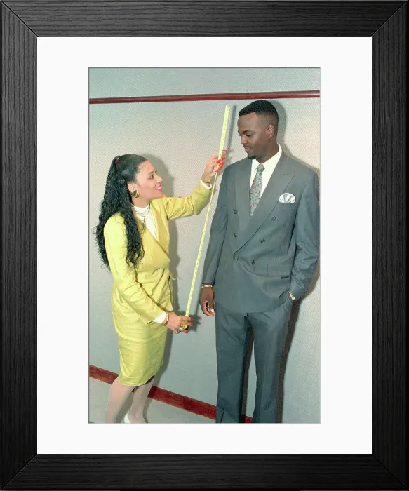 Framed Print : Woman Taking Measurements of George McCloud Framed Print : Woman Taking Measurements of George McCloud