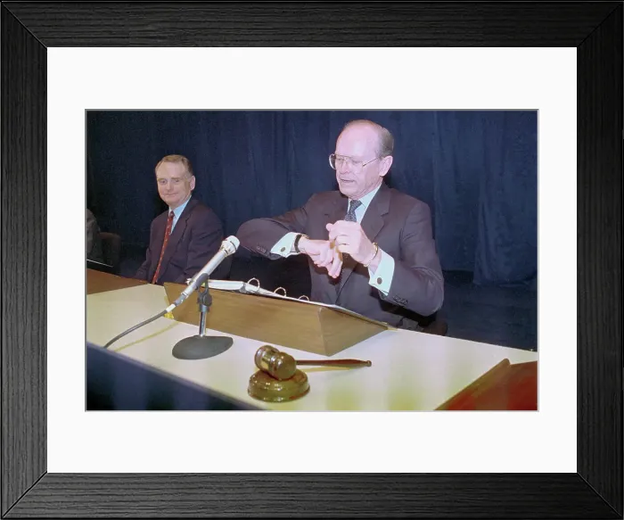 Framed Print : Donald Petersen Glancing at His Watch