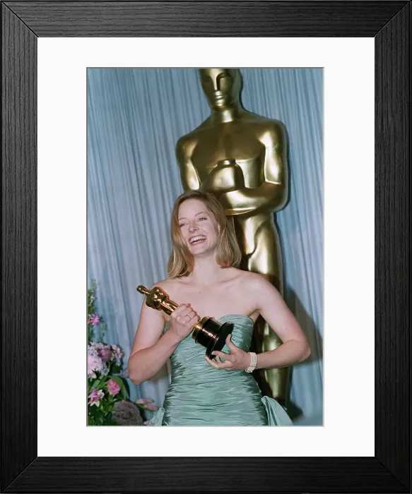 Framed Print : Actress Jodie Foster Holding Her Oscar Award