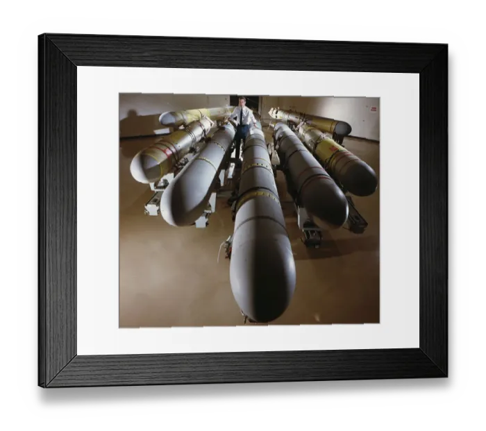 Framed Print : Man Standing with Tomahawk Cruise Missiles Framed Print : Man Standing with Tomahawk Cruise Missiles