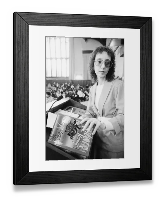 Framed Print : Joyce Carol Oates Holding a Book Framed Print : Joyce Carol Oates Holding a Book