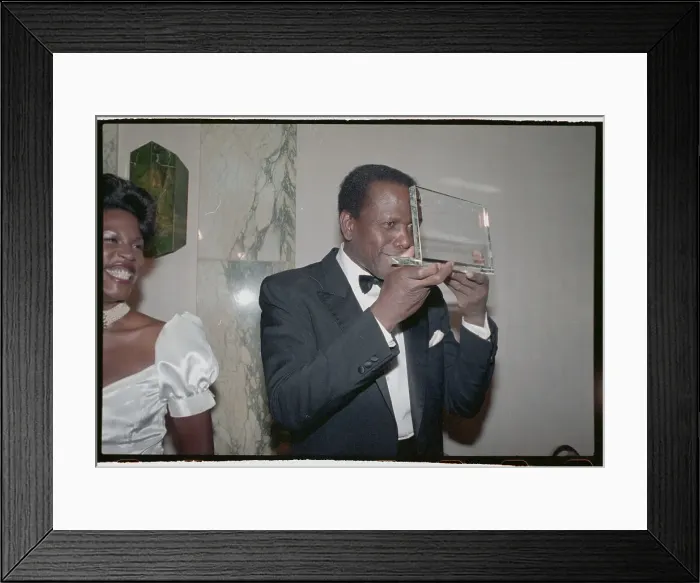 Framed Print : Sidney Poitier Holding Award Framed Print : Sidney Poitier Holding Award