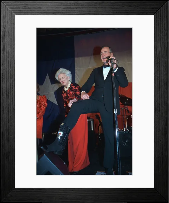Framed Print : George Bush and Wife Showing Off Cowboy Boots