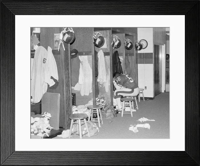 Framed Print : Lawrence Taylor Sitting with Head in His Hands Framed Print : Lawrence Taylor Sitting with Head in His Hands