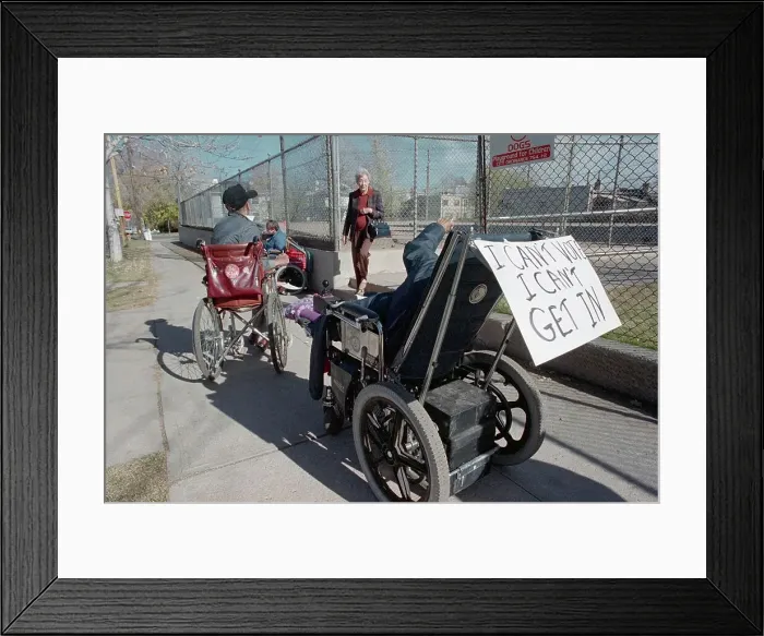 Framed Print : Man in Wheelchair Trying to Vote Framed Print : Man in Wheelchair Trying to Vote