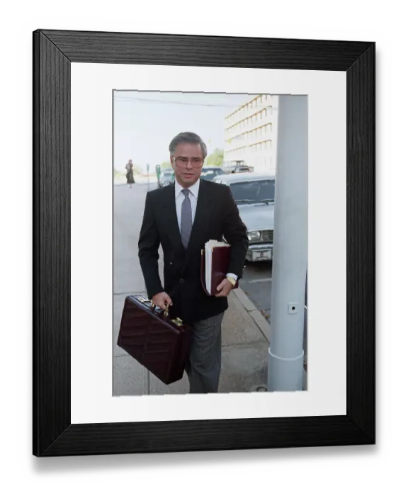 Framed Print : Jim Bakker with Briefcase and Papers Framed Print : Jim Bakker with Briefcase and Papers