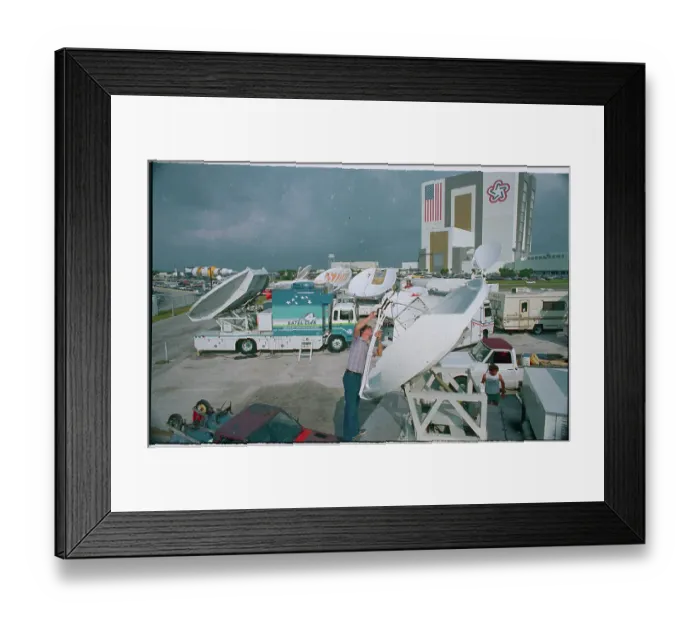 Framed Print : Worker Installing Satellite Dish Framed Print : Worker Installing Satellite Dish