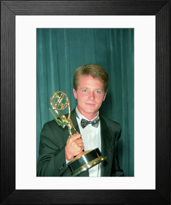 Framed Print : Michael J. Fox Holding Emmy Award Framed Print : Michael J. Fox Holding Emmy Award
