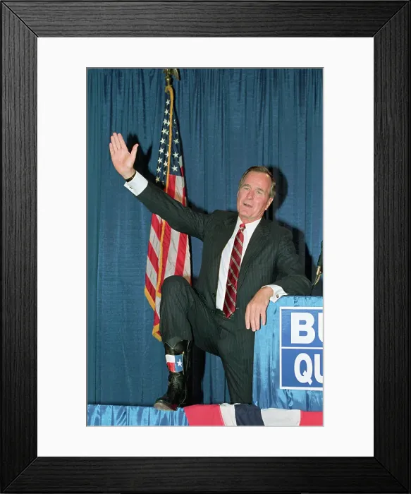 Framed Print : George Bush Displaying Cowboy Boots Framed Print : George Bush Displaying Cowboy Boots