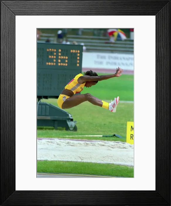 Framed Print : Jackie Joyner-Kersee Sailing Through the Air Framed Print : Jackie Joyner-Kersee Sailing Through the Air