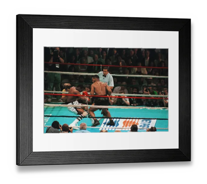 Framed Print : Mike Tyson Punching Michael Spinks