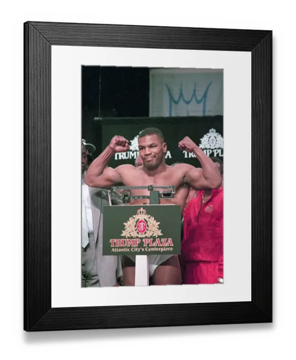 Framed Print : Mike Tyson Flexes Muscle on Scale Framed Print : Mike Tyson Flexes Muscle on Scale
