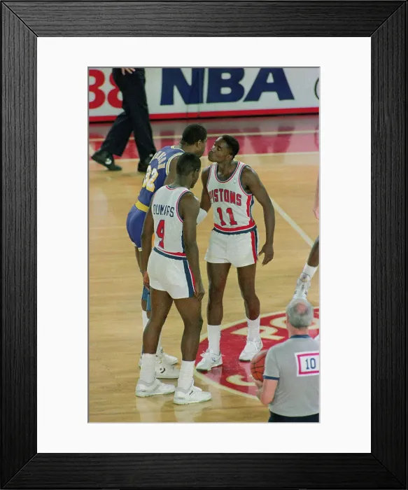 Framed Print : Basketball Players Kissing Framed Print : Basketball Players Kissing