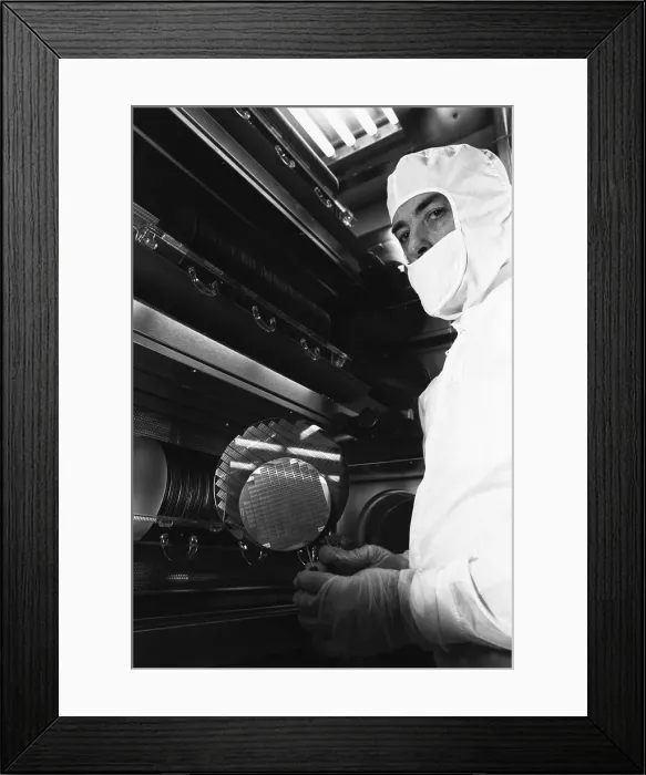 Framed Print : IBM Worker Holding Silicon Wafers Framed Print : IBM Worker Holding Silicon Wafers