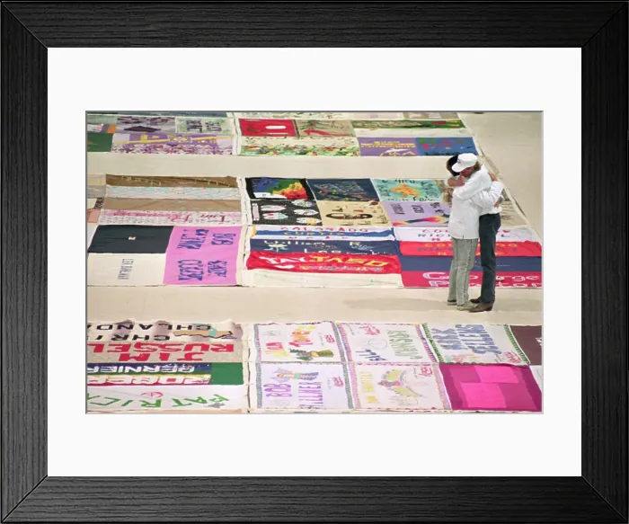 Framed Print : Visitors to the National Aids Quilt Hugging Framed Print : Visitors to the National Aids Quilt Hugging