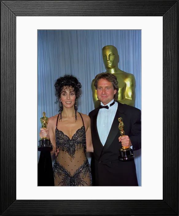 Framed Print : Michael Douglas and Cher Posing with Oscars Framed Print : Michael Douglas and Cher Posing with Oscars