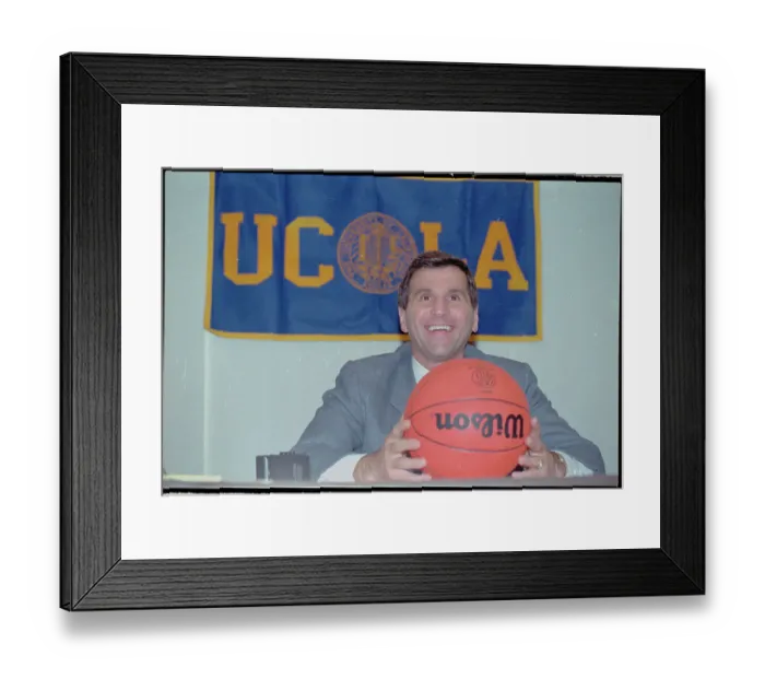 Framed Print : Jim Harrick Posing with Basketball