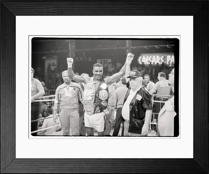 Framed Print : Evander Holyfield Raises Arms Wears Belt