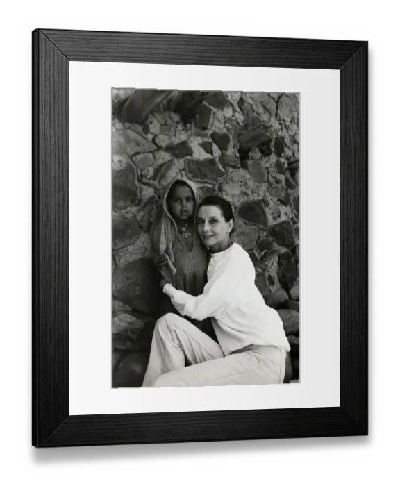 Framed Print : Audrey Hepburn Hugging Ethiopian Child Framed Print : Audrey Hepburn Hugging Ethiopian Child