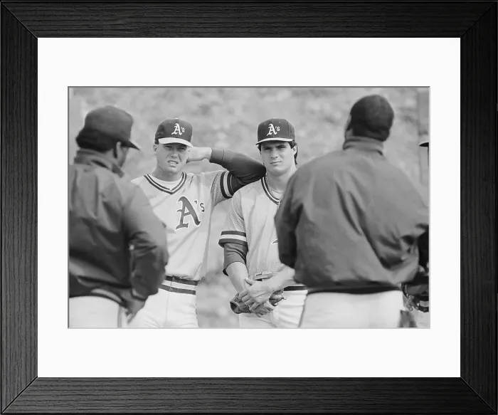Framed Print : Mark McGwire and Jose Canseco Speaking with Coaches Framed Print : Mark McGwire and Jose Canseco Speaking with Coaches