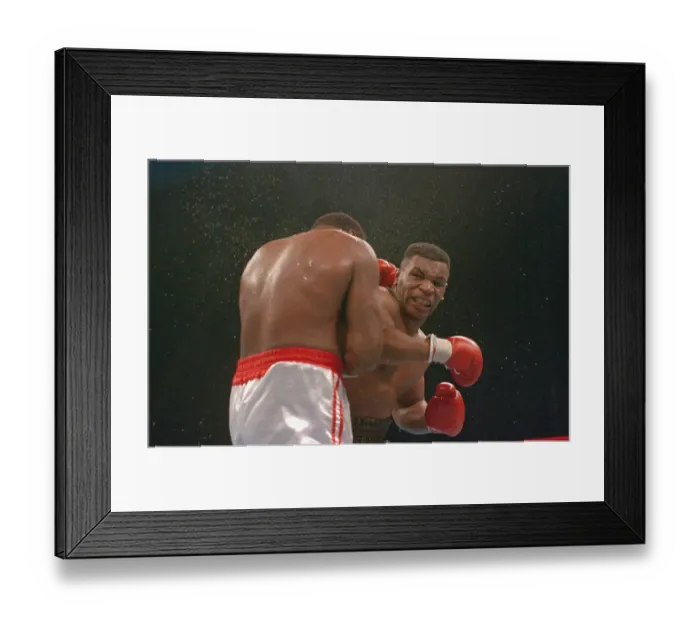 Framed Print : Mike Tyson Punching Larry Holmes Framed Print : Mike Tyson Punching Larry Holmes