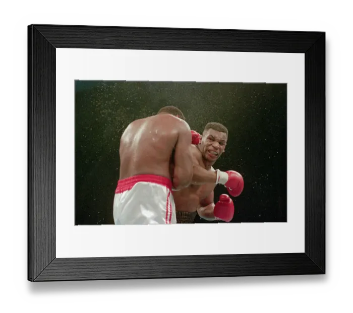 Framed Print : Mike Tyson Delivers KO Punch To Larry Holmes Framed Print : Mike Tyson Delivers KO Punch To Larry Holmes