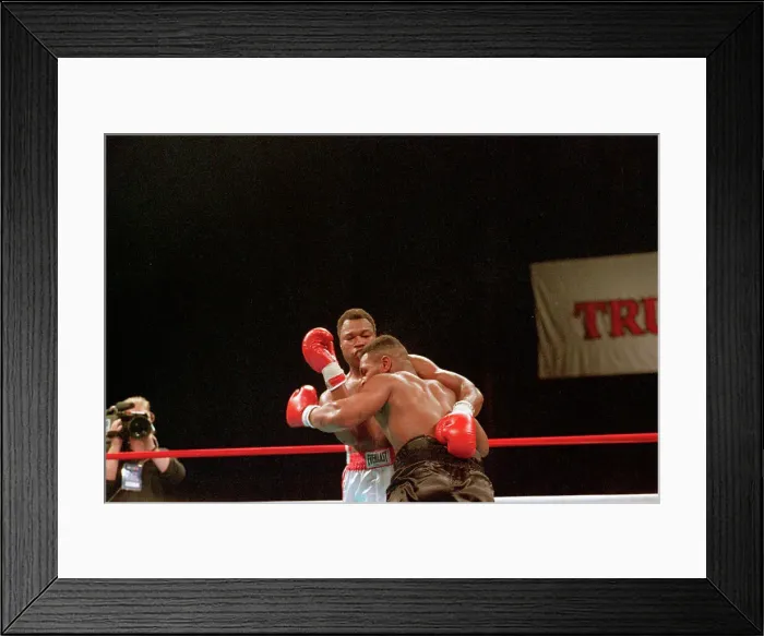 Framed Print : Mike Tyson Holds Larry Holmes Against Ropes Framed Print : Mike Tyson Holds Larry Holmes Against Ropes