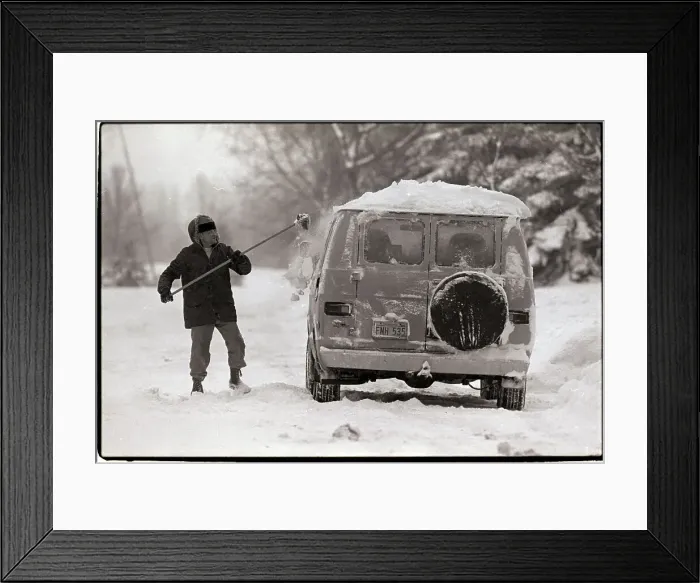 Framed Print : Man Sweeping Snow from Van Framed Print : Man Sweeping Snow from Van