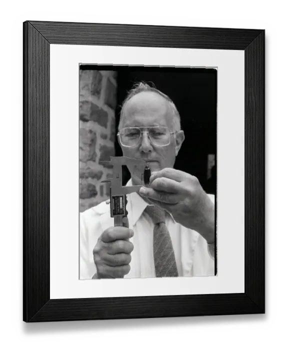 Framed Print : Entomologist Measuring Cockroach Size Framed Print : Entomologist Measuring Cockroach Size