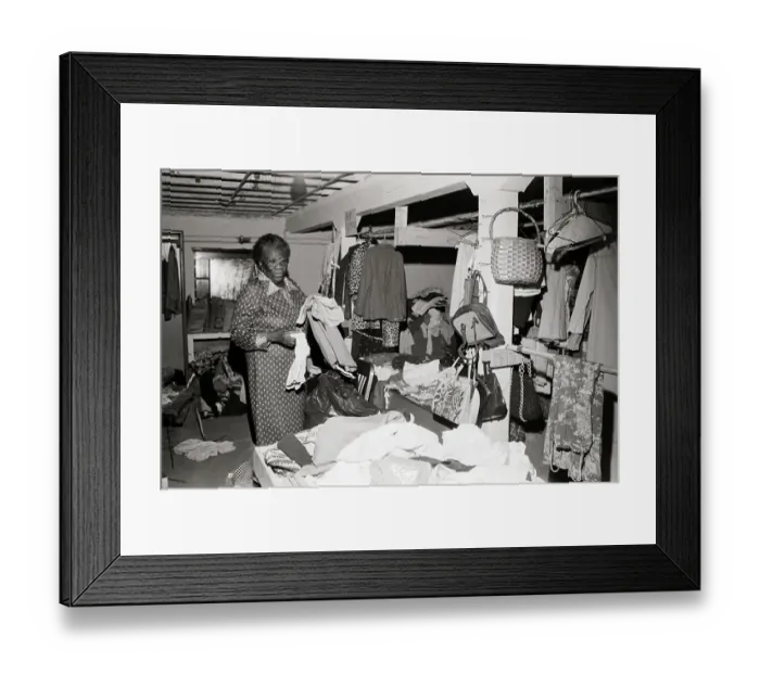 Framed Print : Woman Sorting Clothes for Homeless Framed Print : Woman Sorting Clothes for Homeless