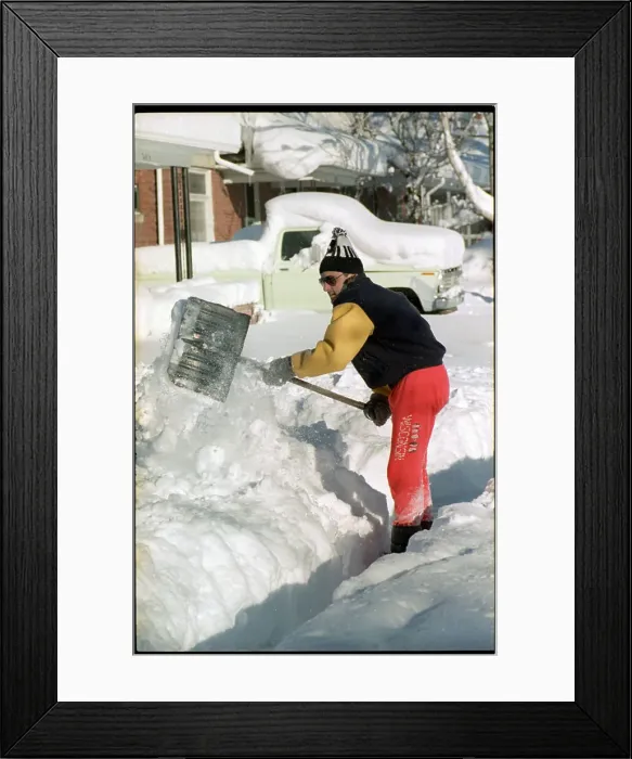 Framed Print : Man Digging Through Two Feet of Snow Framed Print : Man Digging Through Two Feet of Snow