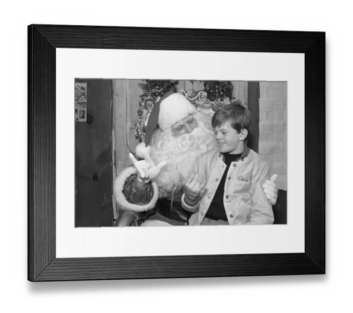 Framed Print : Santa Claus Signing to Deaf Child Framed Print : Santa Claus Signing to Deaf Child