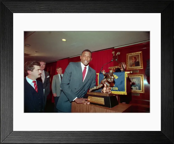 Framed Print : Football Player Tim Brown Posing by His Heisman Trophy Framed Print : Football Player Tim Brown Posing by His Heisman Trophy