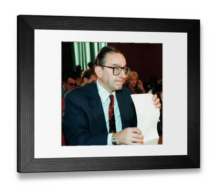 Framed Print : Alan Greenspan Holding Document Framed Print : Alan Greenspan Holding Document