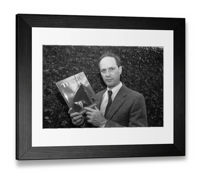 Framed Print : Robert Ballard Holding a Book Framed Print : Robert Ballard Holding a Book