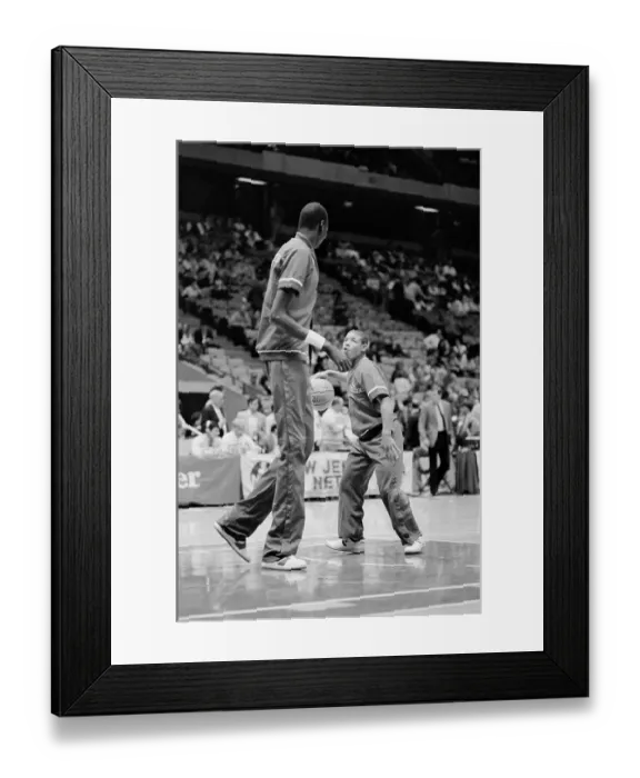 Framed Print : Smallest and Largest Basketball Players Practicing on the Court