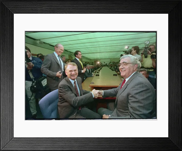Framed Print : Owen Bieber and Harold Poling Shaking Hands