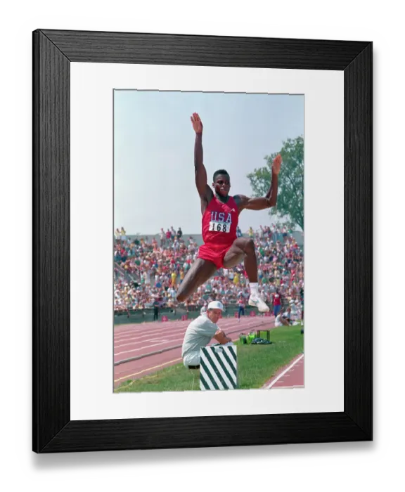 Framed Print : Carl Lewis Participating in Long Jump Framed Print : Carl Lewis Participating in Long Jump