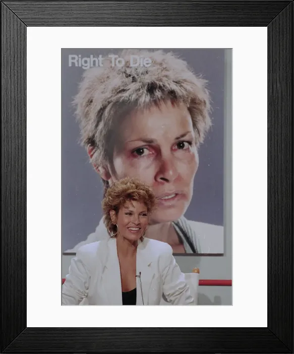 Framed Print : Raquel Welch with Photo of Herself Framed Print : Raquel Welch with Photo of Herself